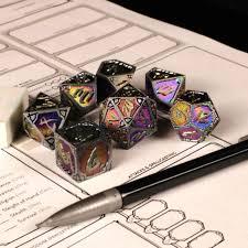 set of dice on a dnd character sheet with a mechanical pencil